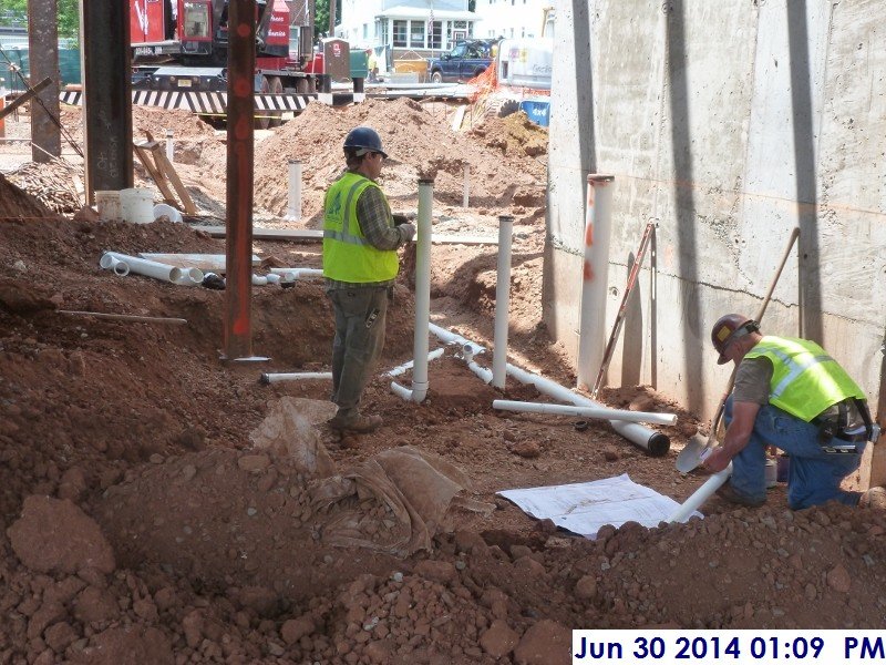 Installing underground sanitary piping at Room 105 (Servery) Facing West (800x600)